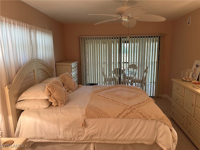 bedroom with multiple windows, carpet flooring, and ceiling fan