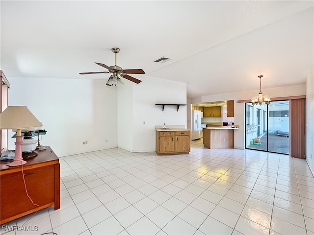 unfurnished living room featuring light tile patterned floors and ceiling fan with notable chandelier