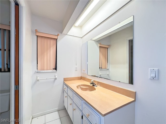 bathroom with vanity and tile patterned flooring