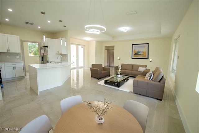 dining space featuring sink