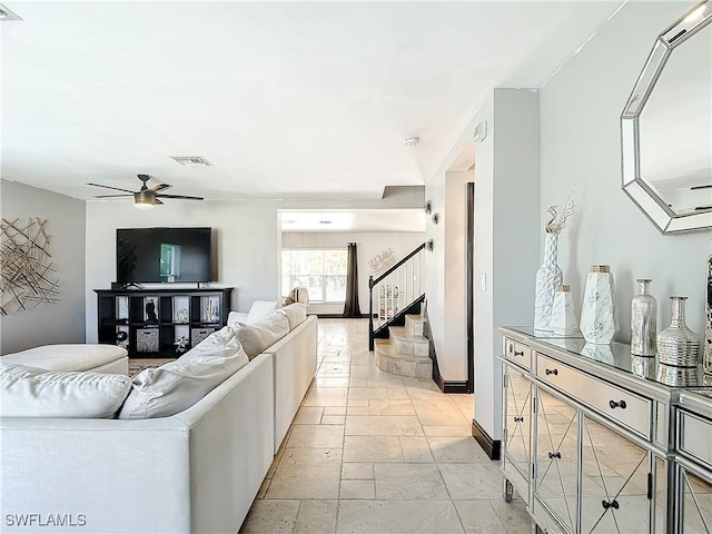 living room with ceiling fan