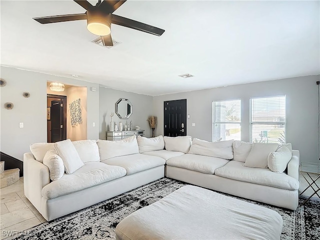 living room with ceiling fan