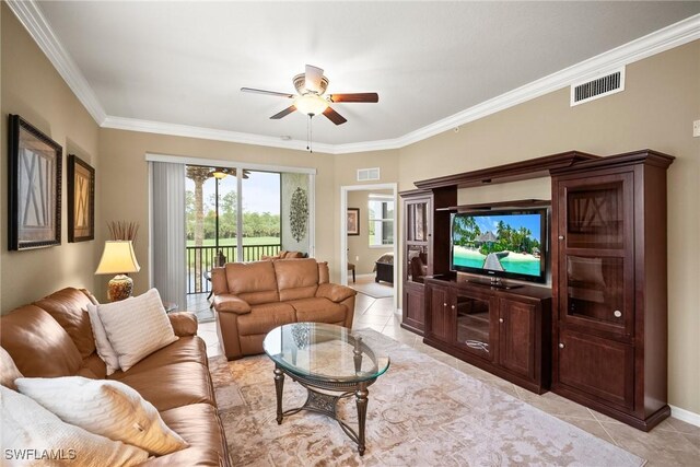 tiled living room featuring ornamental molding and ceiling fan