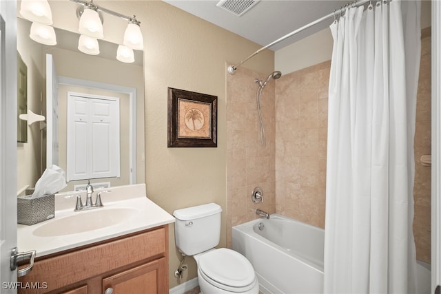 full bathroom featuring shower / bathtub combination with curtain, toilet, and vanity