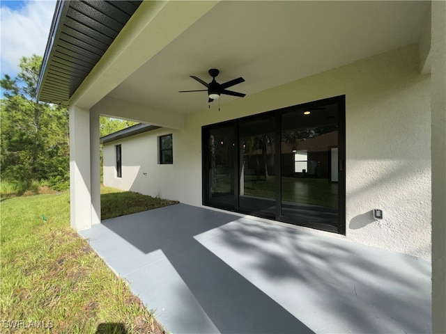 view of patio with ceiling fan