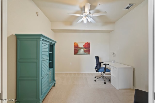 office area with ceiling fan and light carpet