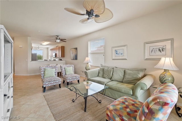 tiled living room featuring ceiling fan