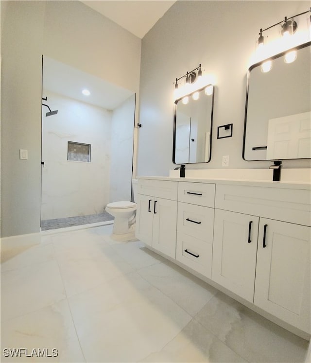 bathroom with walk in shower, vanity, toilet, and tile patterned floors