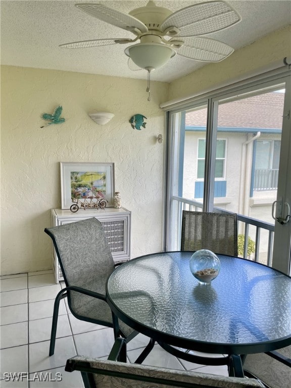 interior space with ceiling fan