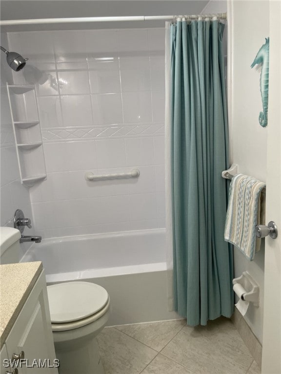 full bathroom with toilet, shower / bath combo with shower curtain, vanity, and tile patterned floors