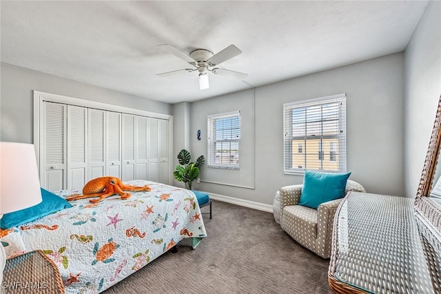 carpeted bedroom with a closet and ceiling fan