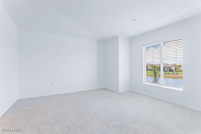 spare room featuring carpet floors