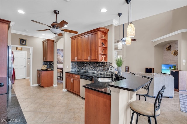 kitchen featuring sink, stainless steel appliances, light tile patterned floors, crown molding, and ceiling fan