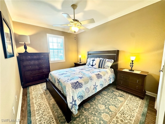 bedroom with ceiling fan, hardwood / wood-style flooring, and crown molding