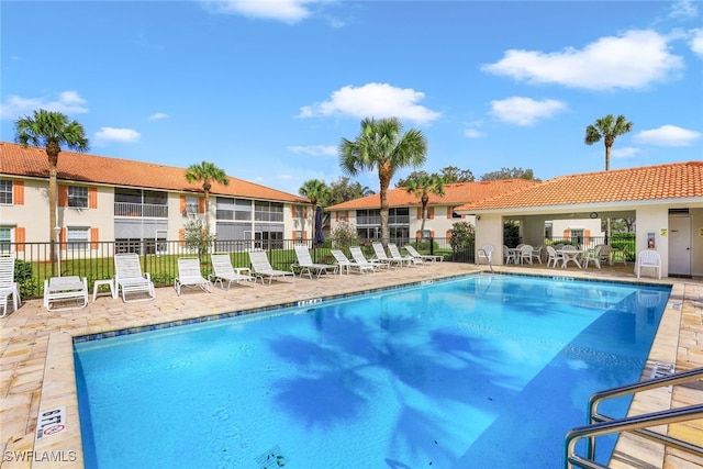 view of pool featuring a patio