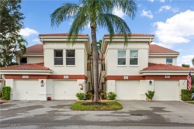 view of front of property with a garage