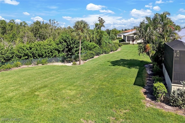 view of yard with fence