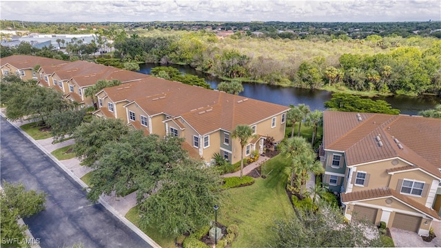 aerial view featuring a water view and a residential view