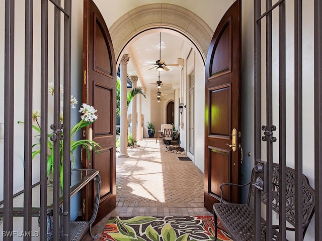 entrance foyer featuring ceiling fan