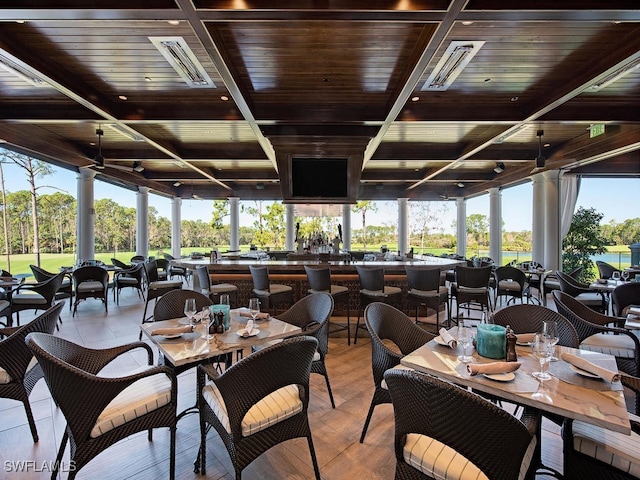 interior space featuring wood ceiling, plenty of natural light, and wood-type flooring