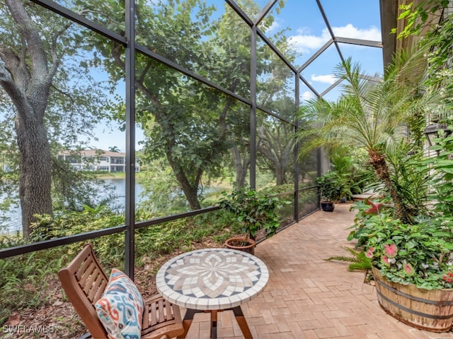 sunroom with a water view