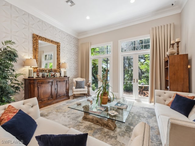 living room featuring ornamental molding, hardwood / wood-style floors, and french doors