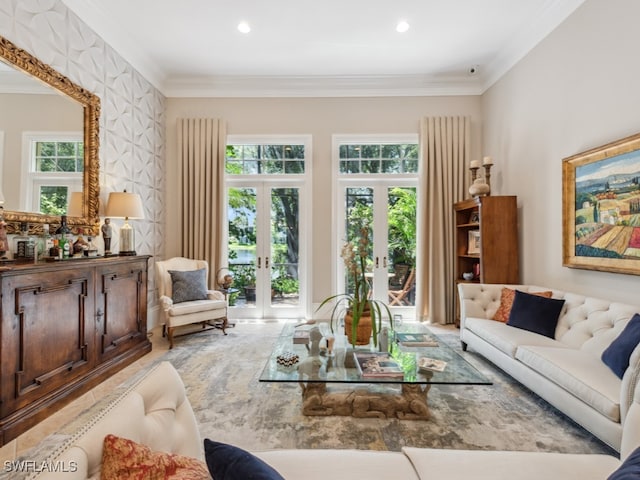 living room featuring a healthy amount of sunlight, ornamental molding, and french doors