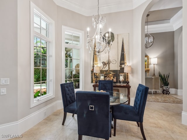 dining room featuring crown molding, light tile patterned floors, and an inviting chandelier