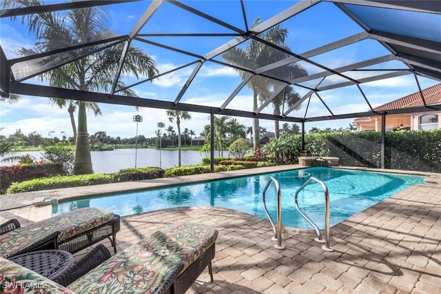 view of pool with a water view, pool water feature, a lanai, and a patio area