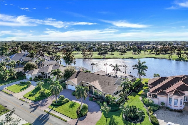 birds eye view of property featuring a water view