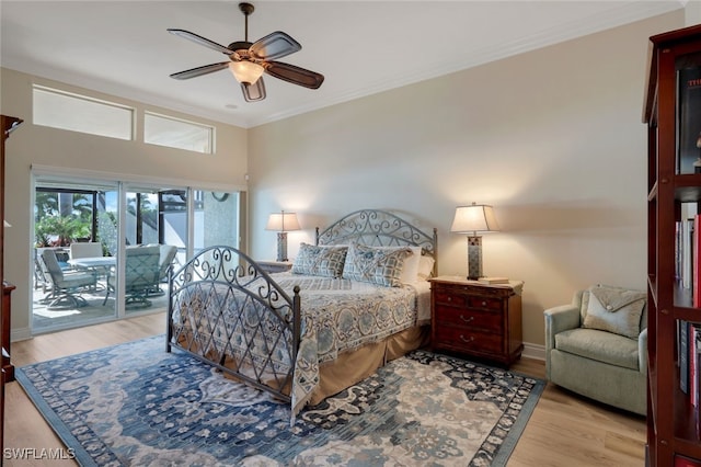 bedroom featuring ceiling fan, ornamental molding, access to exterior, and light wood-type flooring