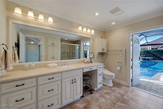 bathroom with a shower with door, crown molding, vanity, and toilet