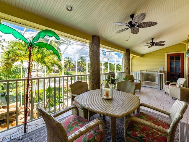 exterior space with ceiling fan