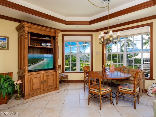 dining room with light tile patterned floors, crown molding, plenty of natural light, and a notable chandelier