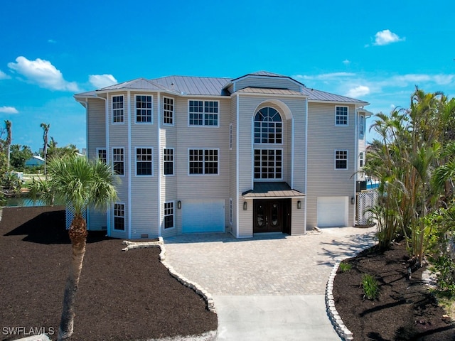 view of front of property featuring a garage