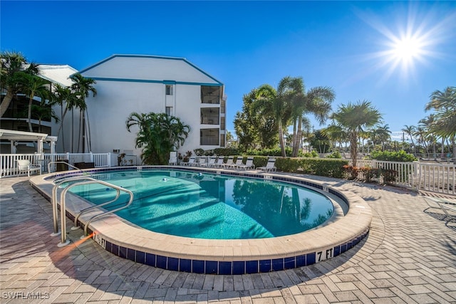 view of pool featuring a patio