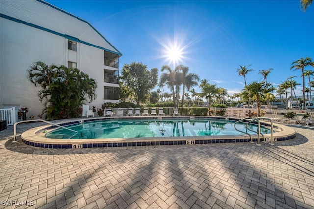 view of pool featuring a patio