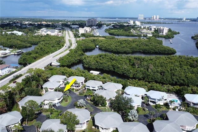 birds eye view of property featuring a water view