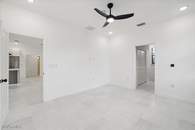 spare room featuring visible vents, recessed lighting, and ceiling fan