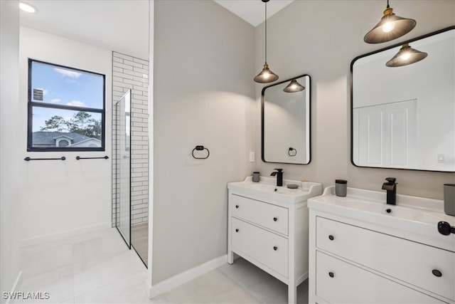 bathroom with vanity, walk in shower, and tile patterned flooring