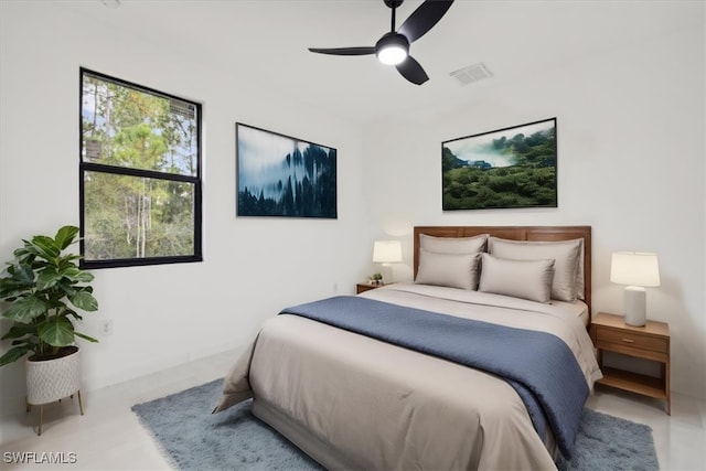 bedroom with a ceiling fan and visible vents