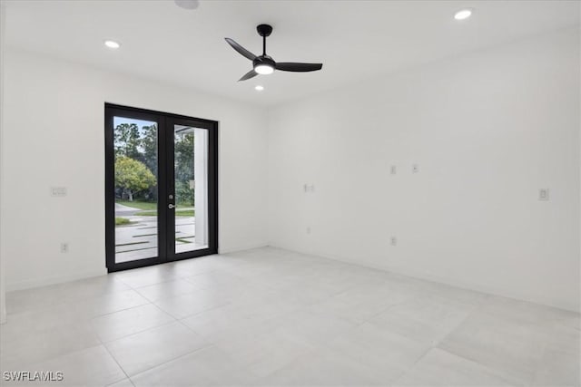 spare room featuring recessed lighting, french doors, and ceiling fan