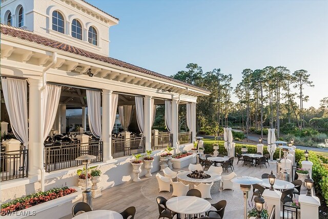 view of patio / terrace with an outdoor fire pit