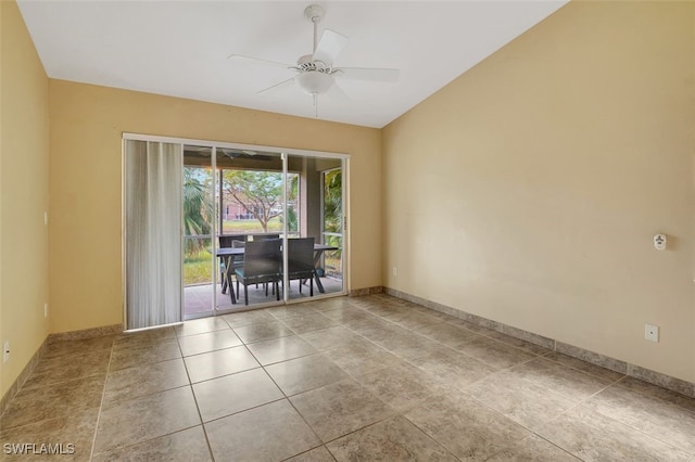 unfurnished room featuring ceiling fan and light tile patterned flooring