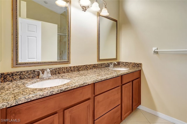 bathroom featuring tile patterned flooring and vanity