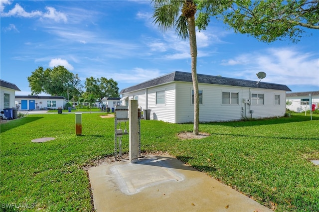 view of property exterior featuring a yard