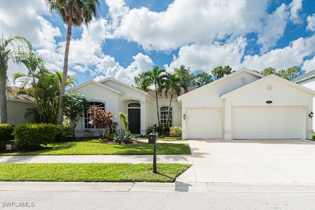 ranch-style home with a garage