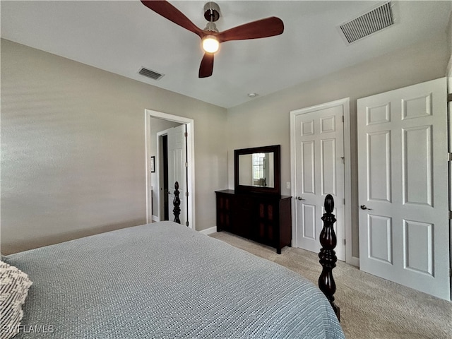 bedroom featuring ceiling fan and light colored carpet