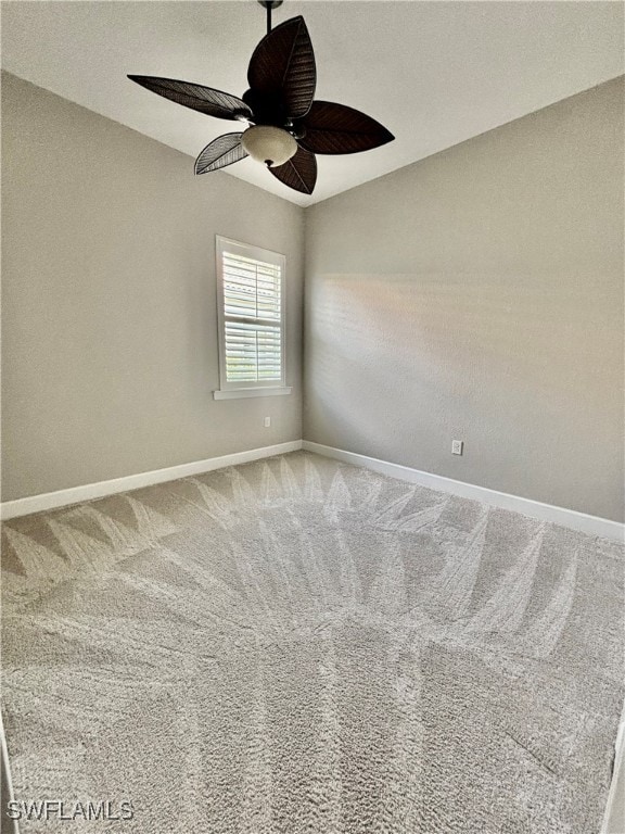 unfurnished room featuring carpet and ceiling fan