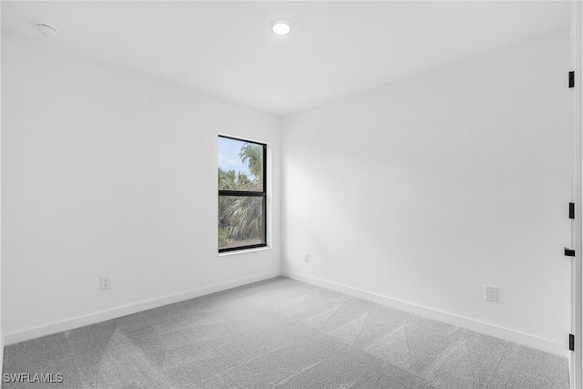 2739 NE 5th Ave, Cape Coral, FL 33909 - carpeted spare room featuring baseboards and recessed lighting